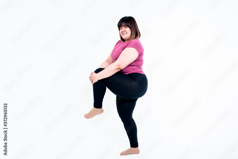 Portrait images of Asain attractive fat woman are exercise to lose weight On white background, to people and health care concept Portrait images of Asain attractive fat woman are exercise to lose weight On white background, to people and health care concept