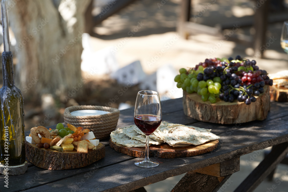 Wine and snack set. Antipasto and catering table Wine and snack set. Antipasto and catering table
