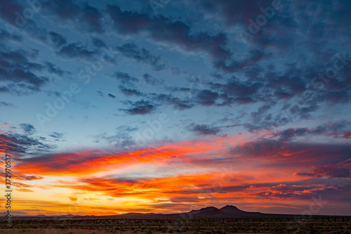 Fiery Sunset in the mountains Mojave Desert © FroZone