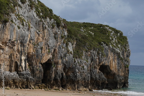 Asturias. Cuevas del Mar. Cliffs and beach. Spain