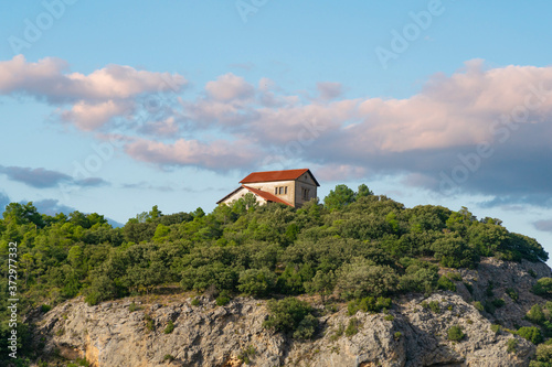 Picturesque house in the middle of a cliff