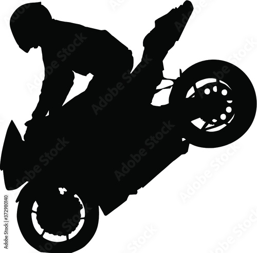 vector silhouette of a motorcycle stunt bike rider stoppie