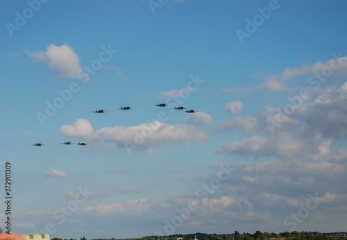 Obraz na plátně A flight of World War II era Supermarine Spitfires perform a fly past