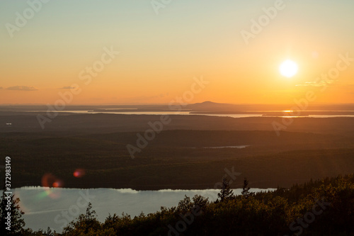 Sunset overlooking Blue Hill, Maine on Cadillac Mountain.