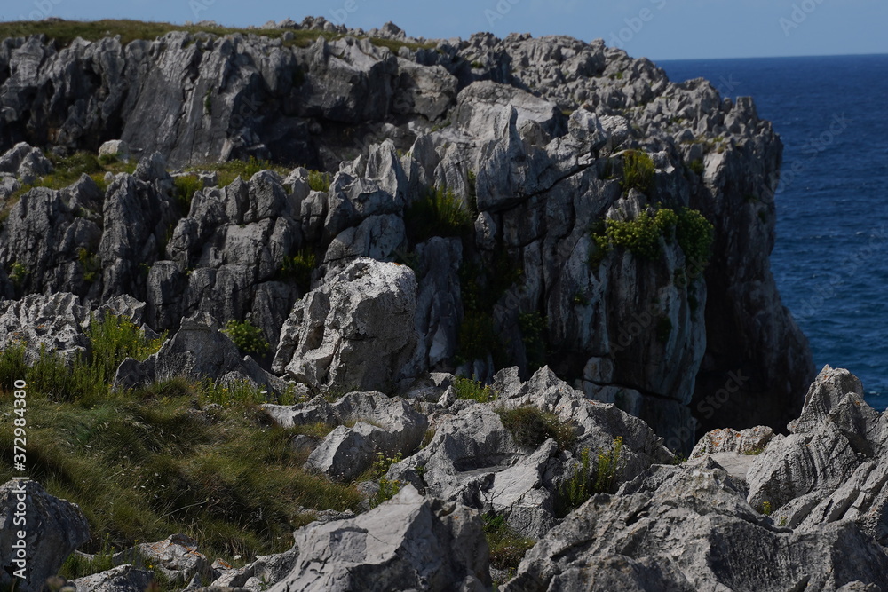 Asturias. Beautiful natural landscape beach rock cliffs. Guadamia,Spain Asturias. Beautiful natural landscape beach rock cliffs. Guadamia,Spain