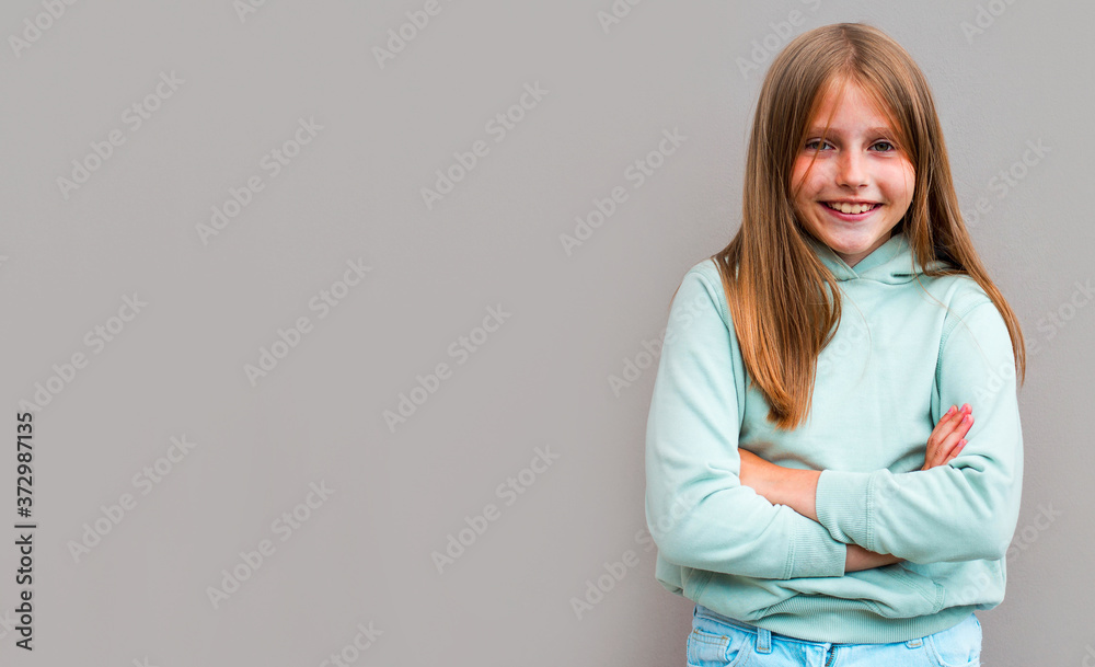 Portrait of beautiful blonde girl smiling looking at camera Portrait of beautiful blonde girl smiling looking at camera
