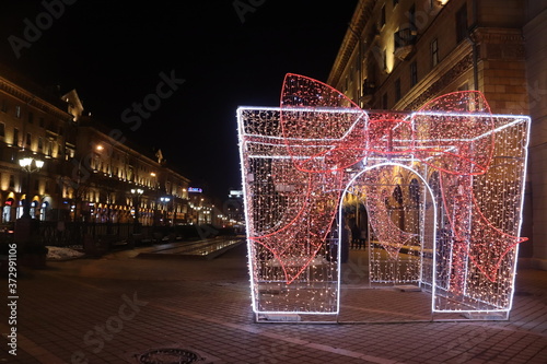 illuminated Christmas archat night street photo