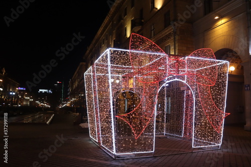 illuminated Christmas archat night street photo