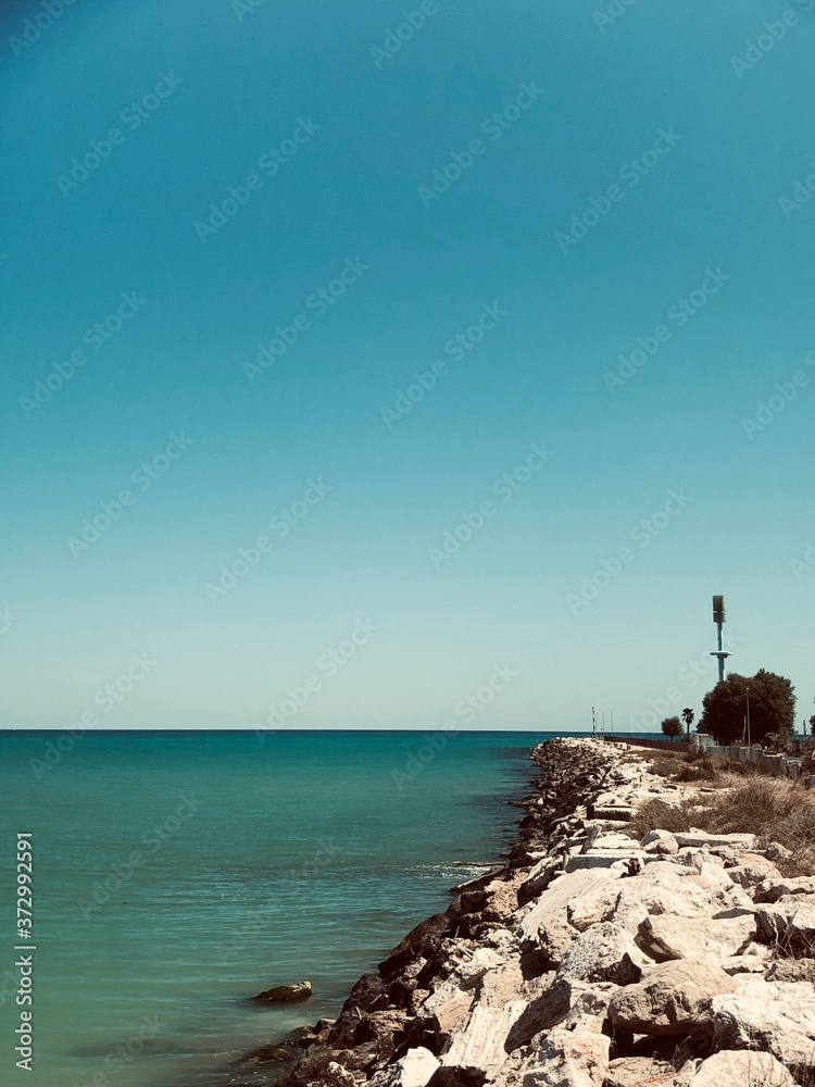 man walking on the beach