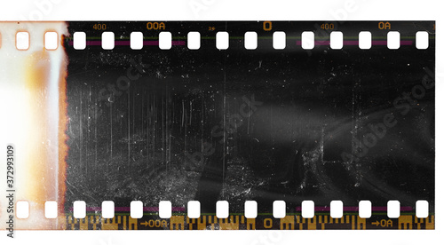 Noisy film frame with heavy noise, dust and grain. Abstract old film background 