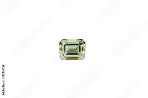 macro mineral faceted stone heliodor, Golden beryl on a white background