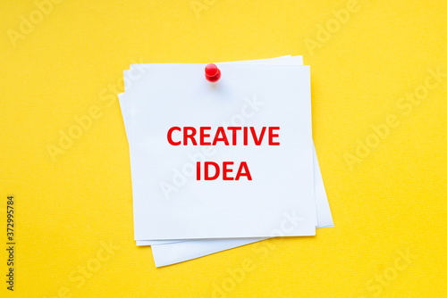 Creative idea. Motivational slogan on white sticker with yellow background