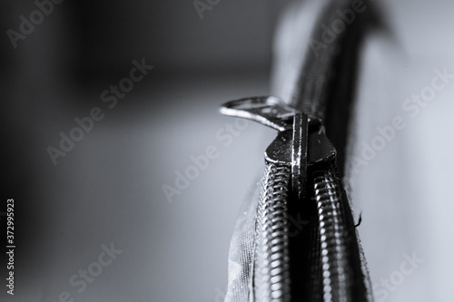 Close-up macro photograph of shabby zipper doggy