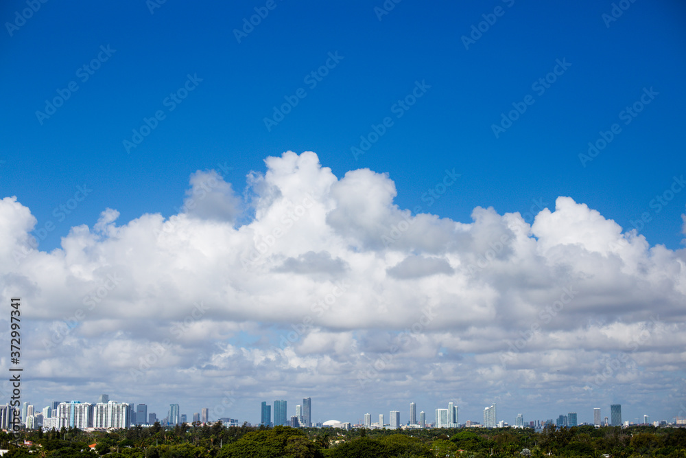 Miami Sky line with clouds on a sunny day 
