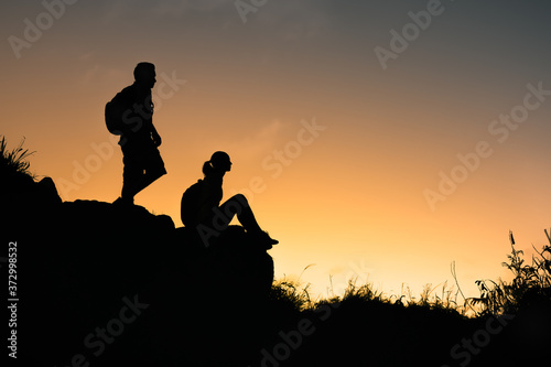 couple enjoying the nature senery on mountain edge   © kieferpix