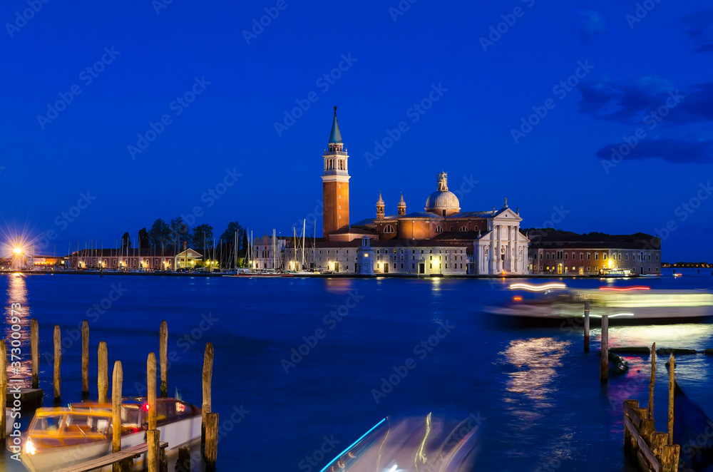 Night Venice, view of Church of San Giorgio Maggiore. Set on an island, an art-filled, bright white church by Palladio giving Venice views from its tower. Night Venice, view of Church of San Giorgio Maggiore. Set on an island, an art-filled, bright white church by Palladio giving Venice views from its tower.