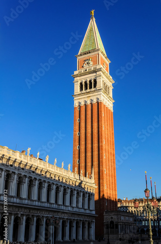 National Library Marciana (Biblioteca Nazionale Marciana) with St Mark's Campanile (Campanile di San Marco) on the background photo