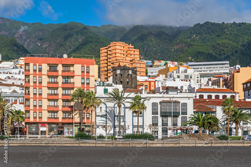 Avenida Maritima with the bell tower of the church Iglesia Colegial del Divino Salvador on La Palma, Canary Islands © laranik