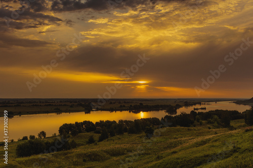 sunset over the river © Evgenii Ryzhenkov