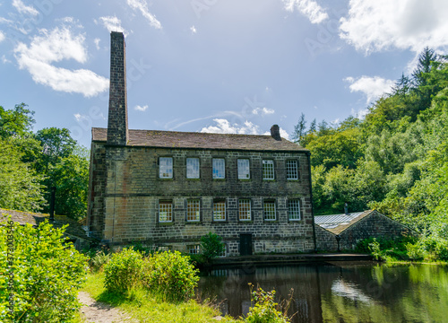 old mill on the river bank