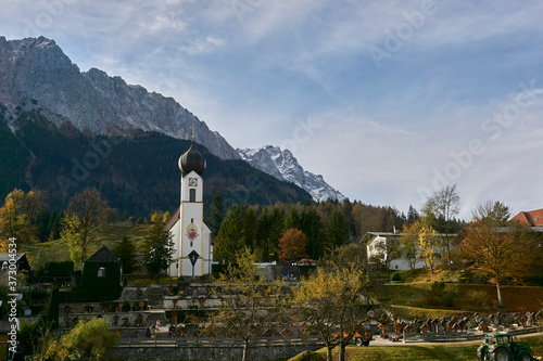 church in the mountains with Zugspitze in the background