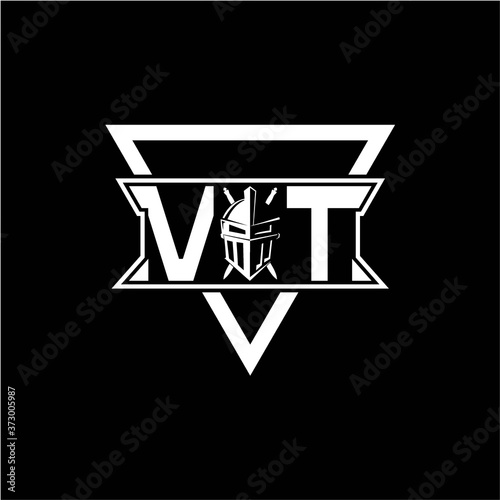 The initials inspiration V T modern knight logo with a triangle