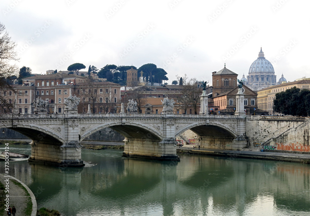 The dome of St. Peter's Basilica, the Tiber River and the Sant'Angelo Bridge, Rome, Italy.