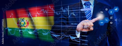 Businessman touching data analytics process system with KPI financial charts, dashboard of stock and marketing on virtual interface. With Bolivia flag in background. photo