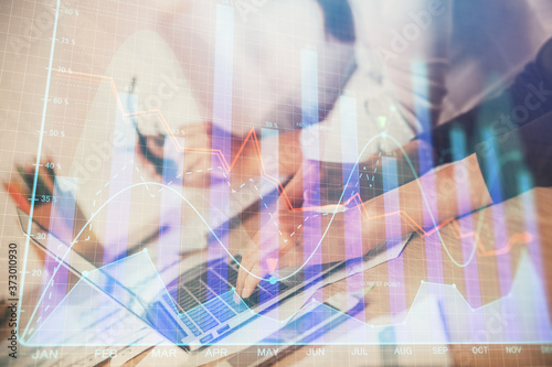 Wallpaper Mural Multi exposure of woman hands typing on computer and financial chart hologram drawing. Stock market analysis concept. Torontodigital.ca