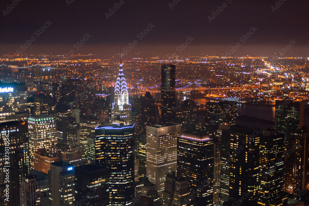 Fototapeta premium View of manhattan from the top at night