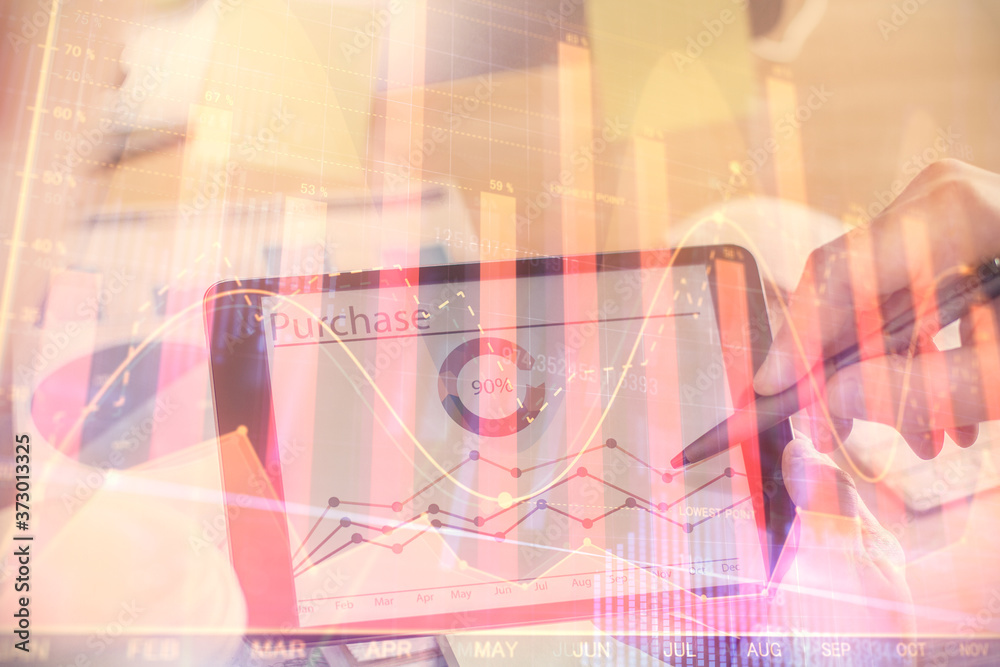 Double exposure of man's hands holding and using a phone and financial chart drawing. Market analysis concept. Double exposure of man's hands holding and using a phone and financial chart drawing. Market analysis concept.