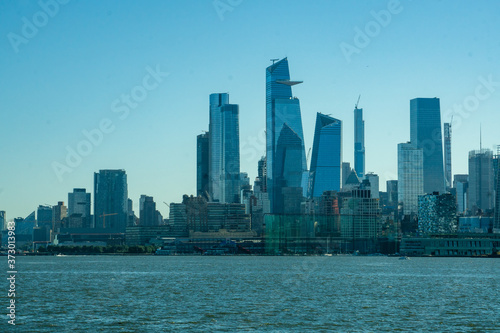 New York, NY / USA - 8/20/20: a view of Hudson Yards on the westside of Manhattan and the Hudson River.