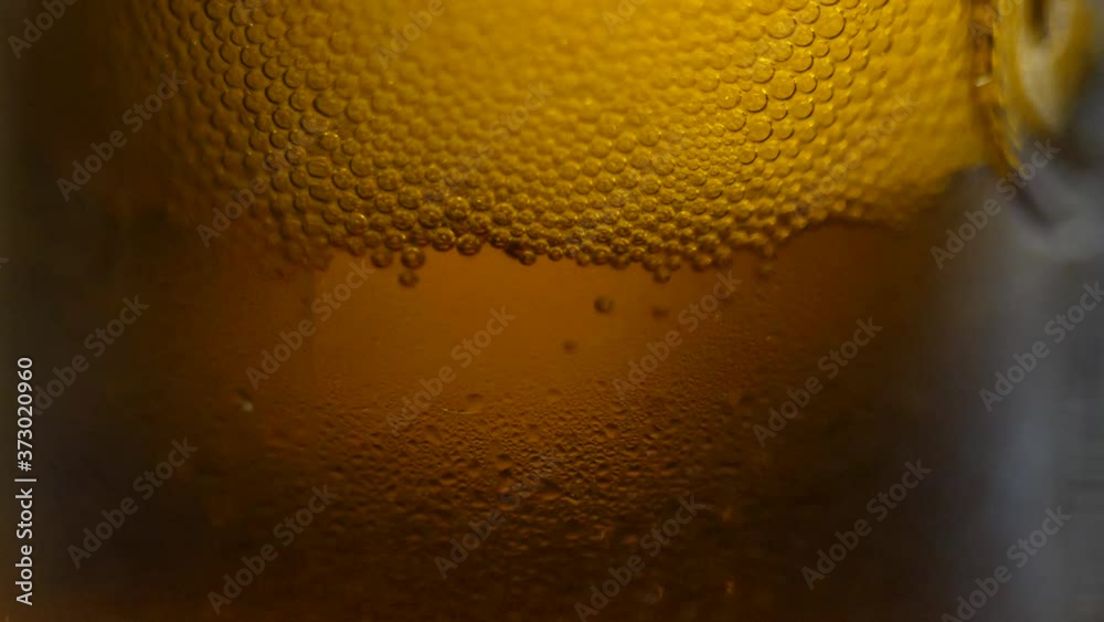 Fresh beer foam bubbled glass texture macro Fresh beer foam bubbled glass texture macro
