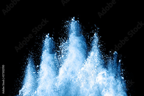Fototapeta Naklejka Na Ścianę i Meble -  Blue sky color powder explosion on black background.