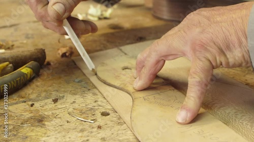 Craftsman artisan making guitar mold 