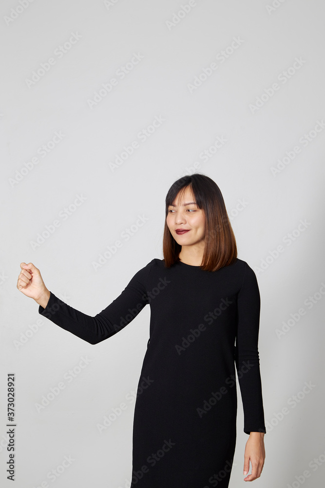 Trick or treat Portrait woman black dress as witch holding for happy halloween black friday, cyber monday, sales, autumn concept Trick or treat Portrait woman black dress as witch holding for happy halloween black friday, cyber monday, sales, autumn concept