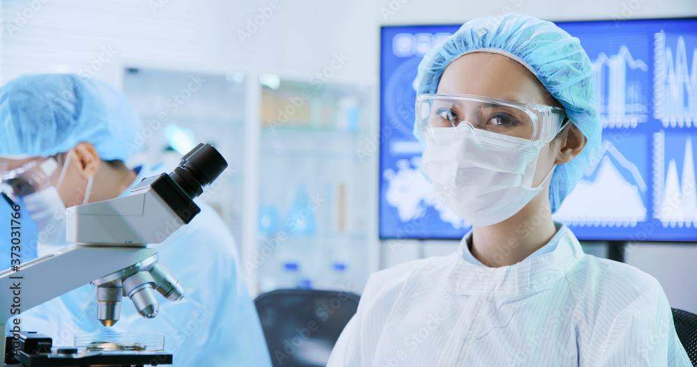 asian scientist use microscope asian scientist use microscope