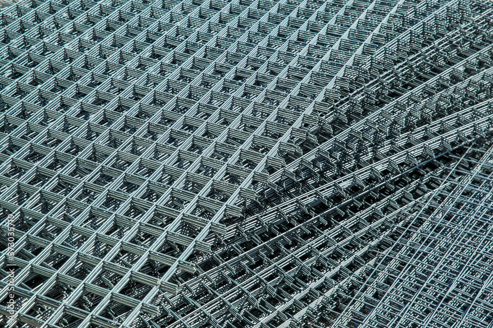 Obraz premium rhythmic structure of a metal grid