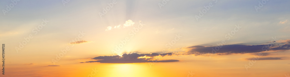 Fototapeta premium Panorama of picturesque sky with a strip of clouds during sunset