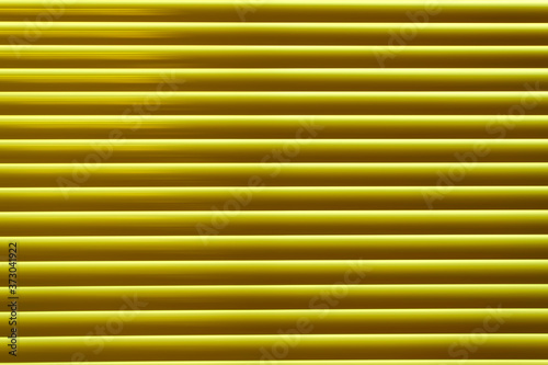 Yellow metal blinds. Abstract horizontal creative background.