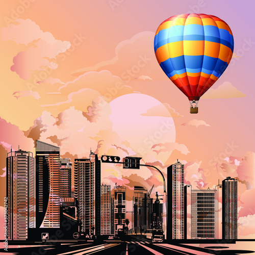 Hot air balloon flying over generic silhouetted stylized urban city skyline set against a stunning dawn or dust pink sky
