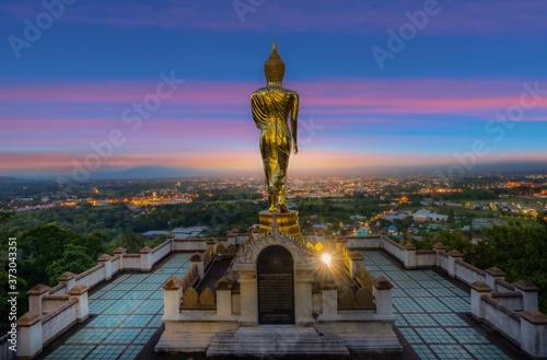  Wat Phrathat Khao Noi with Sunrise and the mist. This temple is the best location view of Nan province, Thailand. © chanchai