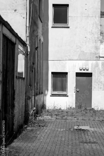 Grayscale shot of an old house at Harbo photo