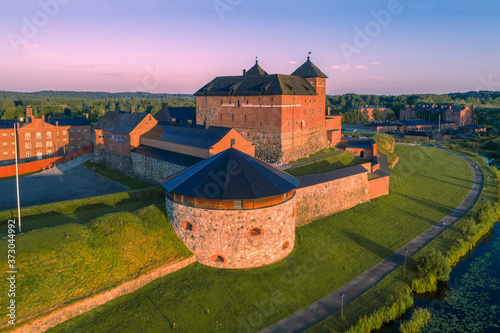 The ancient fortress of the city of Hameenlinna close-up on a sunny July morning (shot from a quadcopter). Finland photo