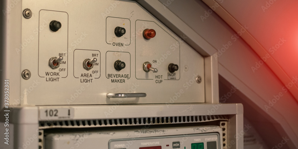 aviation electronics board with switch and red alarm signal indoor airplane cabin aviation electronics board with switch and red alarm signal indoor airplane cabin
