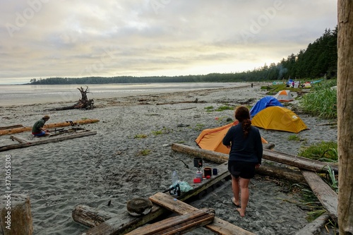 Campers making breakfast earlier at their campsites along the beach at Nels Bight, in Cape Scott Provincial Park, Canada.