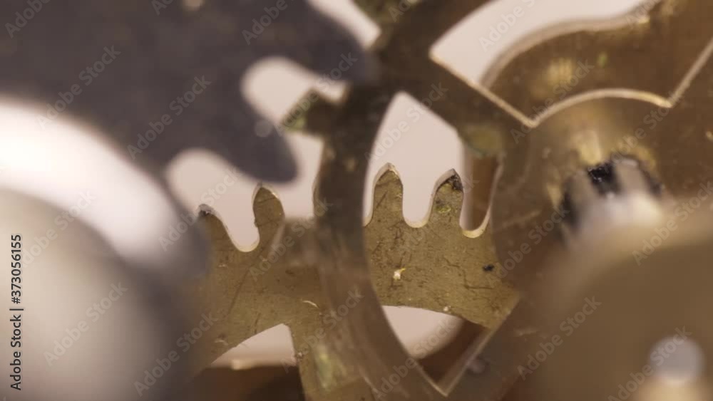 old clock mechanism with metal gears macro shot old clock mechanism with metal gears macro shot