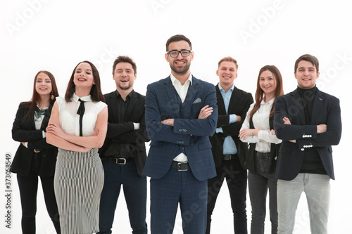 Smiling employees standing around their manager