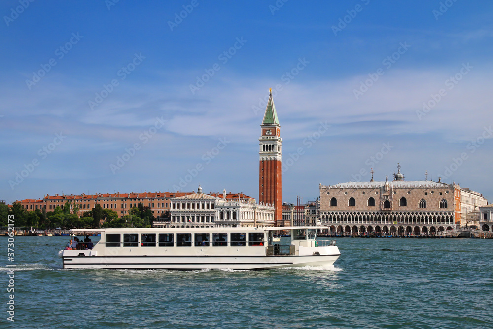 Vaporetto (water bus) going in front of Piazza San Marco in Venice, Italy
