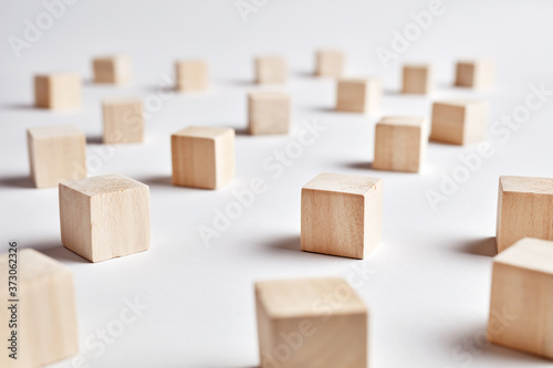 Blank wooden cubes or blocks in a row